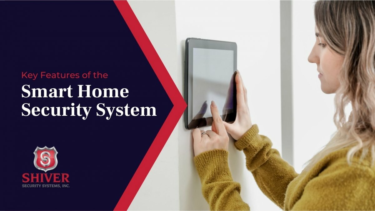 'Key Features of the Smart Home Security System' with woman pressing buttons on security system